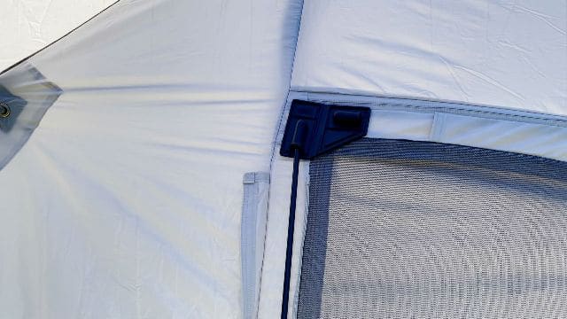 A close-up shot of the rubber gasket at the top of the hinged door.