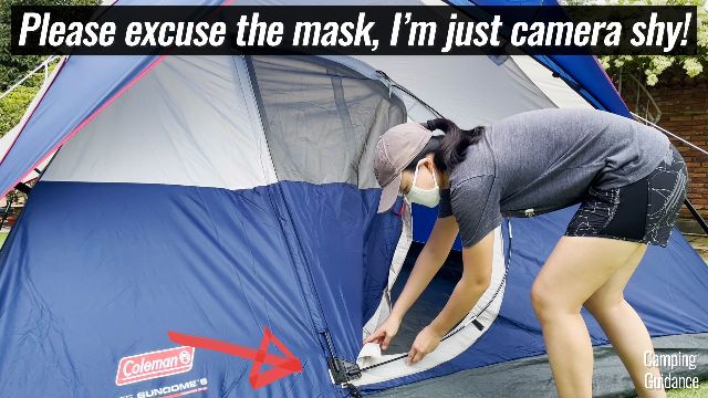 A picture of me having finished setting up the curved pole of the hinged door. The red arrow is pointing to the rubber gasket at the bottom.