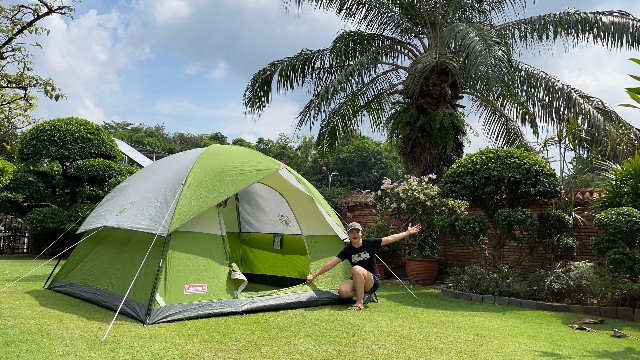 This is a picture of me outside my Coleman Sundome 6 in my yard.