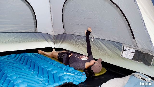 Me sleeping at the side of the Caddis Rapid 6. Just stretching my arm upwards has me touching the wall.