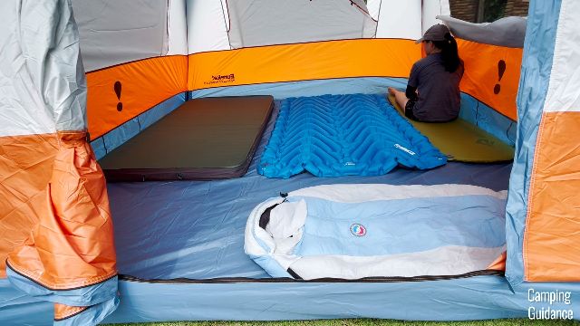 Me sitting on a single pad at the side of the Eureka LX 6. Notice how close to the wall I am!