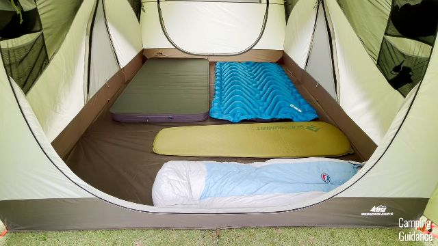 What 6 pads looks like in the REI Wonderland 6. Here you can see the Exped MegaMat Duo 10 (green), Klymit Double V Uninsulated (blue), Sea to Summit Camp Mat SI (yellow), Big Agnes sleeping bag (white).