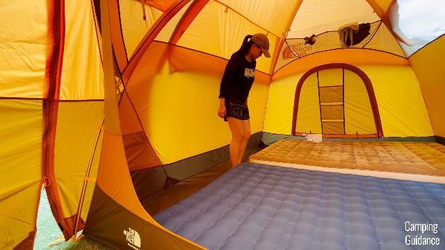 The leftover space after 2 queen beds go in.