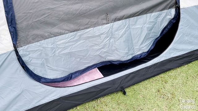 What the door looks like when partially unzipped. Notice it droops inwards.