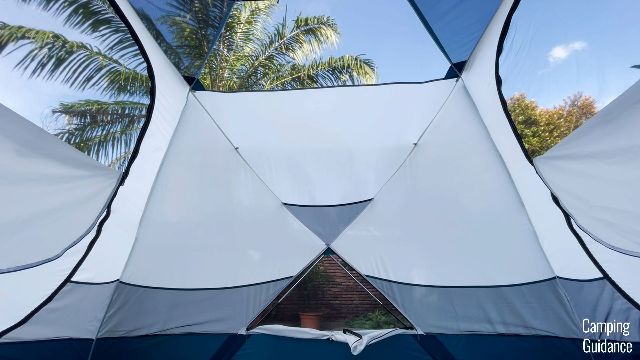 In this picture, you can partially see the 2 windows of the REI Base Camp 6 (left and right), plus the small mesh panel at the bottom.