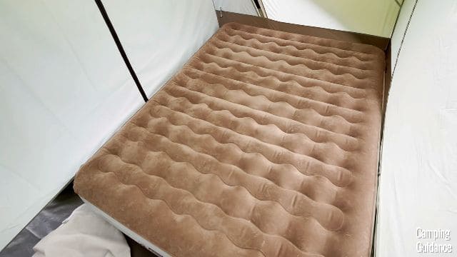 What 1 queen bed in each room looks like.