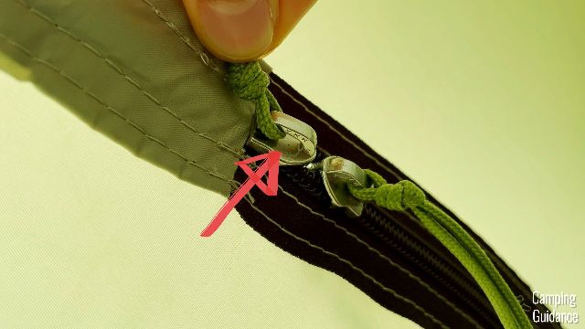 A close-up of the YKK zippers on the doors.