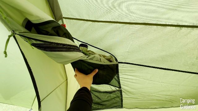 A close-up of the door pocket, with the door fabric stuffed in it.