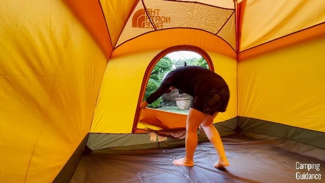 The author zipping up the back door of The North Face Wawona 6.