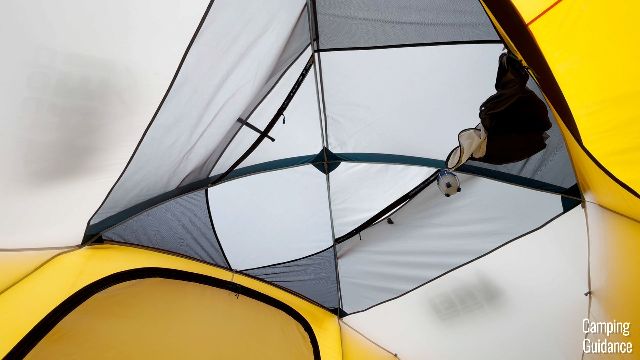 There are 5 overhead loops in the REI Base Camp 6 in this picture here, and that’s my Black Diamond Apollo hanging on one of them.