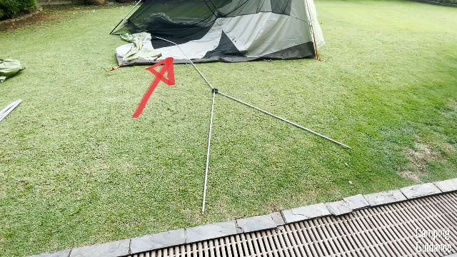 The red arrow is pointing to the bent section of the Y-pole.