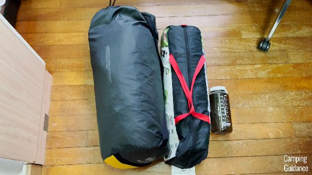 From left to right: REI Base Camp 6, Coleman Sundome 2, 32-oz Nalgene bottle.