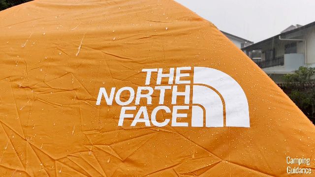 The North Face logo in heavy rain.