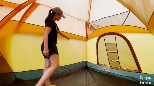 Me checking for the seam taping inside the tent. Where my hand is shows the outline of the rainfly.