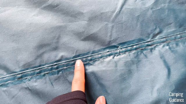 What one of the taped flooring seams look like inside the REI Base Camp 6.