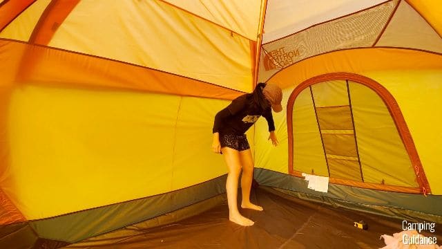 Me checking the back wall of the Wawona 6 from the inside of the tent.