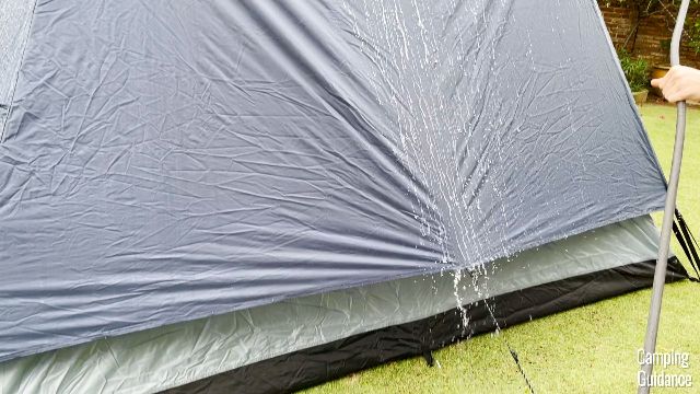 Water running over one of the sides of the Caddis Rapid 6 with a really long rainfly length.