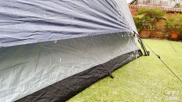 Another angle of the Caddis Rapid 6 rain test. Notice that the water barely touches the tent body and drips straight to the ground instead.