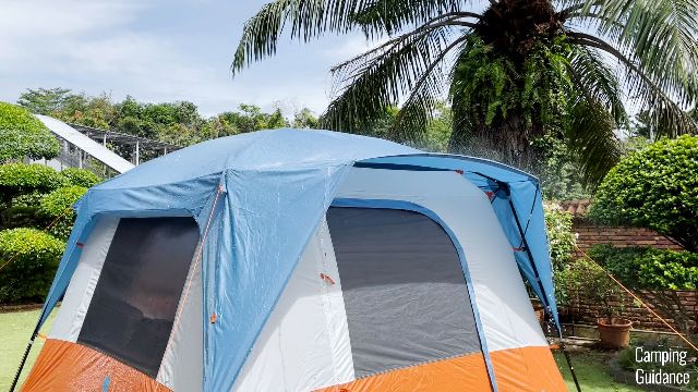 My Eureka LX 6 in the rain. Notice the rain spills towards the sides of the tent instead, not on the mesh of the front door.