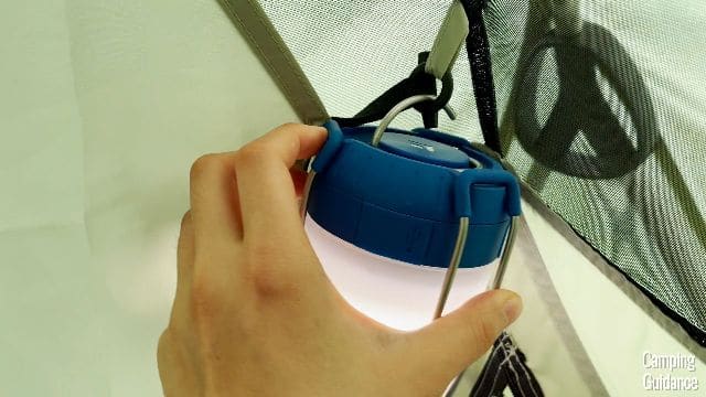 Me hanging a lantern up using the divider loops.