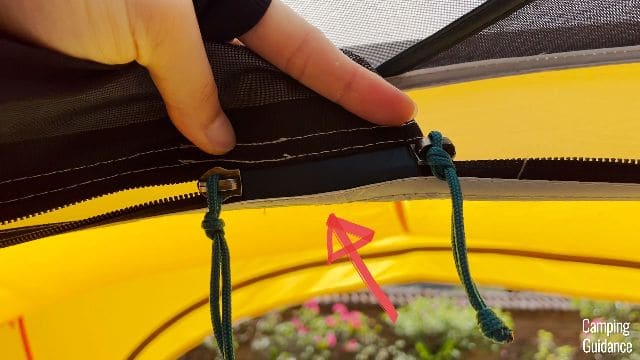 What the REI Base Camp 6’s door looks like when completely unzipped.