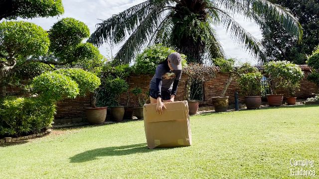 This is a picture of me unboxing the REI Base Camp 6.