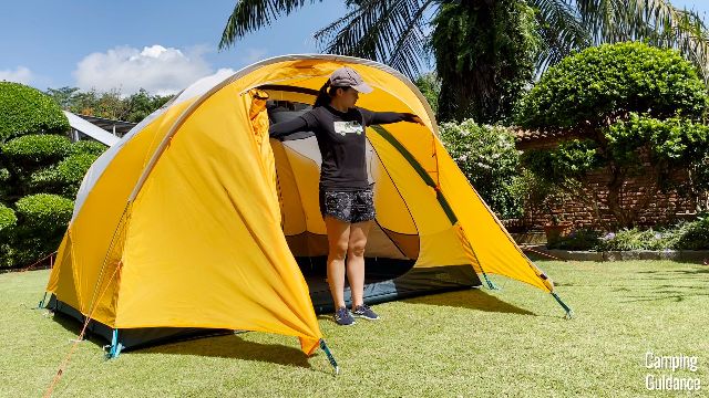 Me standing in the front vestibule of the REI Base Camp 6.