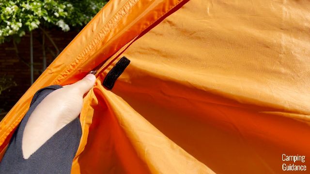 A close-up shot of one of the Velcro strips on the side windows.