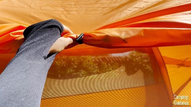 A close-up shot of one of the toggles of the side window.