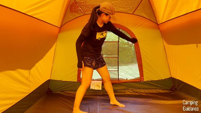 Me unzipping the back window of the Wawona 6.