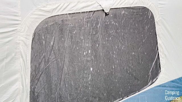 The back window of the REI Skyward 4 in the rain