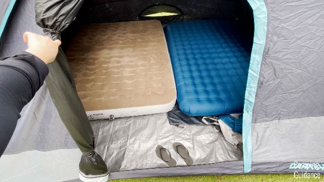 2 queen beds inside the Ozark Trail Dark Rest Instant Cabin 6