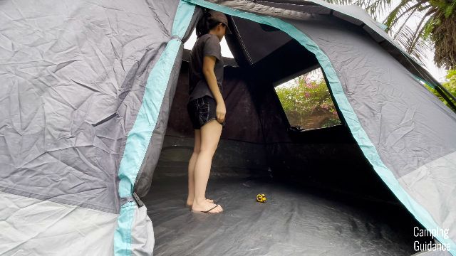 The author standing in her Ozark Trail Dark Rest Instant Cabin 6