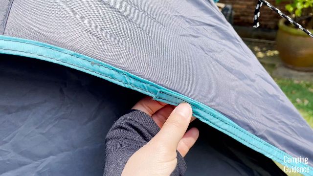 A close-up shot of one of the seams in the Ozark Trail Dark Rest Instant Cabin 6