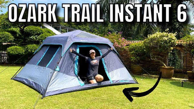 The author in her Ozark Trail Dark Rest Instant Cabin 6 (product image)