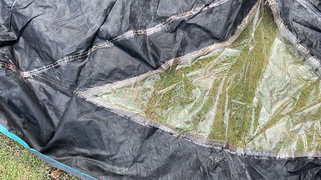 Seam taping on the Ozark Trail Dark Room Instant Cabin 6