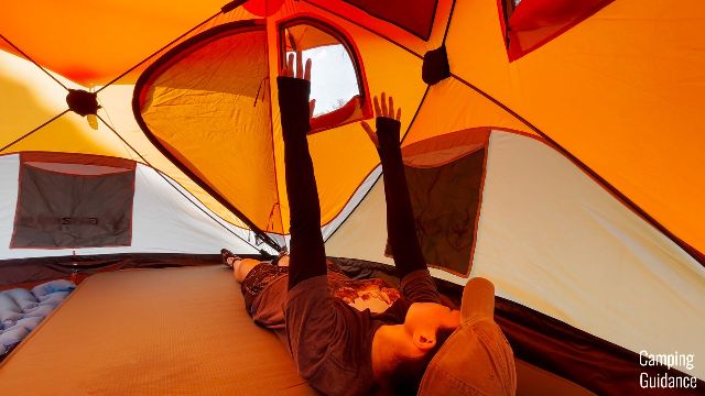 The author sleeping at the side of the Gazelle T4 Hub Tent