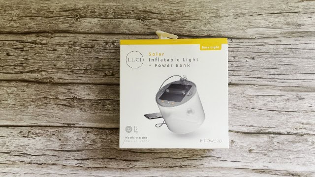 The author unboxing the BioLite Luci Charge 360 lantern.