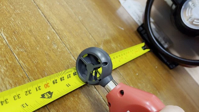 The author measuring the airflow distance of the Coleman CPX 6 Lighted Tent Fan.