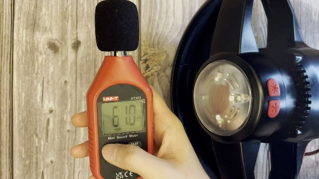 The author measuring the noise levels of the Coleman CPX 6 Lighted Tent Fan.