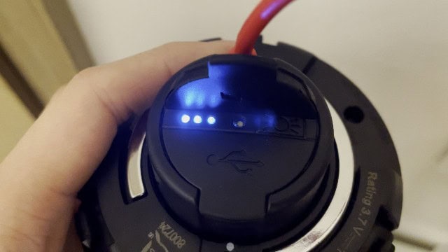 The author charging the Coleman OneSource Fan.