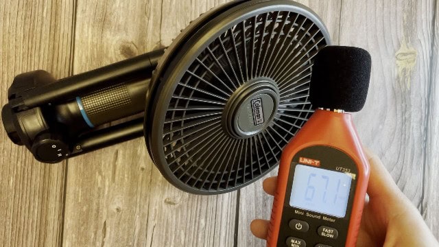 The author testing the noise level of the Coleman OneSource Fan.