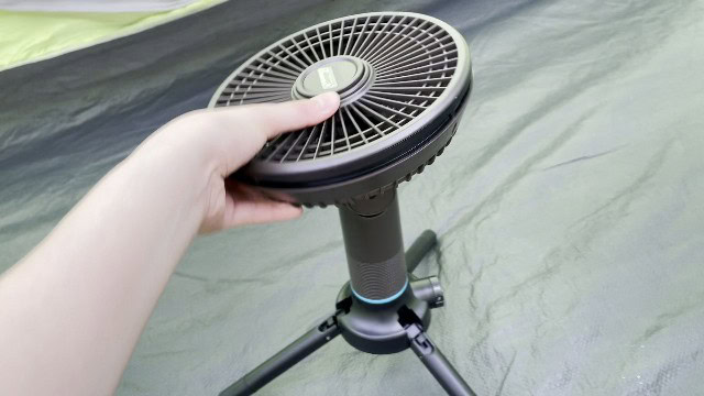 The author rotating the head of the Coleman OneSource Fan.