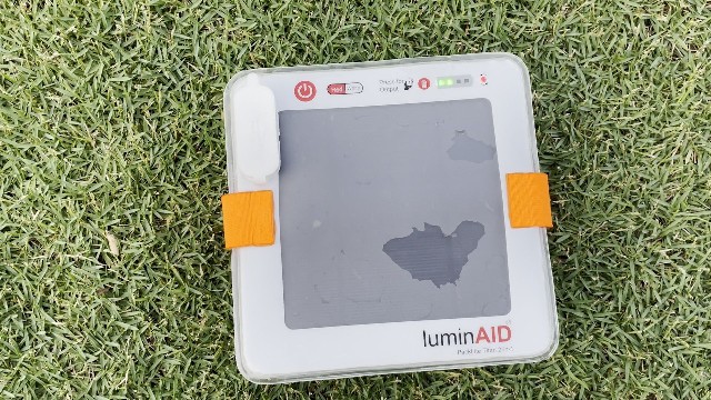 The author solar charging the LuminAID PackLite Titan.