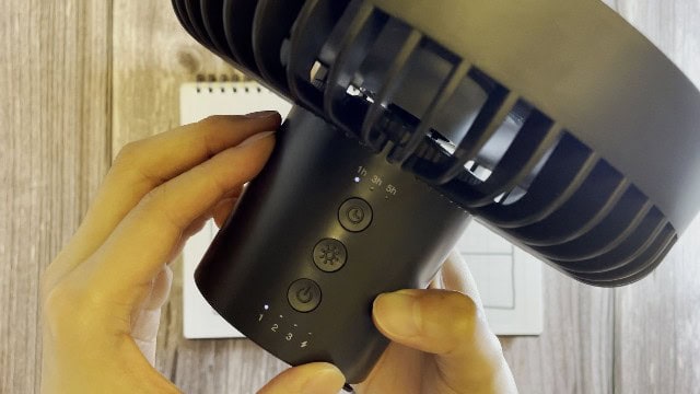 The author using the sleep timer on the Nitecore NEF10 Fan.