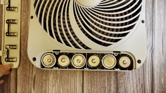 The 6 D batteries of the O2Cool Treva Fan.