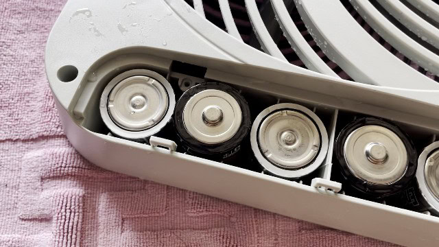 A wet battery compartment of the O2Cool Treva Fan.
