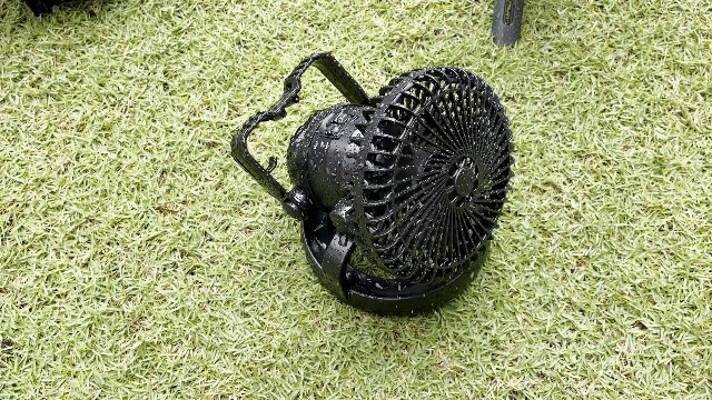 The Odoland Camping Fan in heavy rain.
