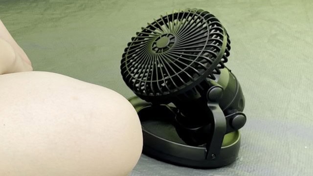 The Odoland Camping Fan has a stand for it to balance on the ground.