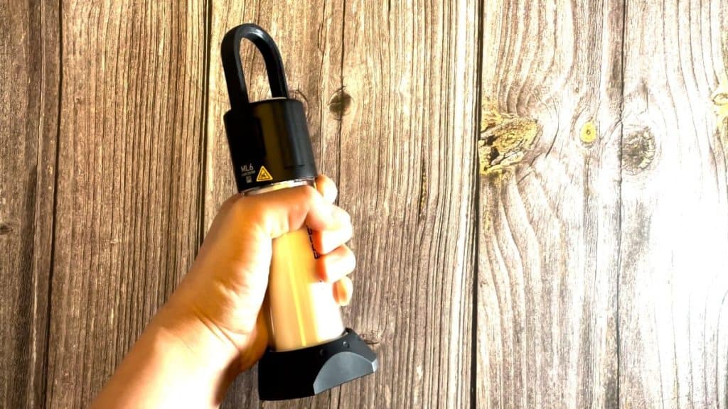 The author holding the Ledlenser ML6 in her palm